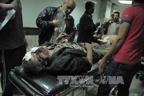 Nạn nhân một vụ đánh bom ở Syria (Nguồn: AFP/TTXVN)