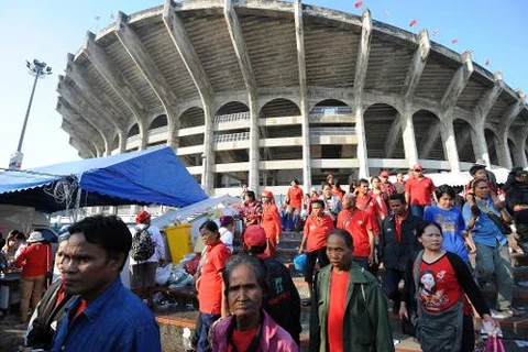 Phong trào "Áo đỏ" ủng hộ Chính phủ Thái Lan ngày 11/12 tuyên bố ủng hộ cuộc bầu cử sắp tới ở nước này (Nguồn: AFP)