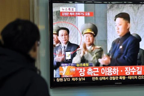Truyền hình Hàn Quốc đưa tin về việc Triều Tiên thanh trừng ông Jang Song-Thaek (Nguồn: AFP)