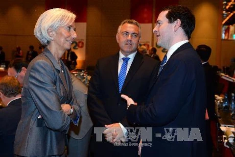 Tổng Giám đốc Quỹ tiền tệ quốc tế (IMF) Christine Lagarde (trái) và Bộ trưởng Tài chính Anh George Osbourne (phải) trước Hội nghị. AFP/ TTXVN