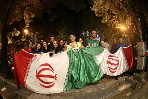 Người dân Iran ăn mừng thỏa thuận hạt nhân lịch sử. (Nguồn: AFP)