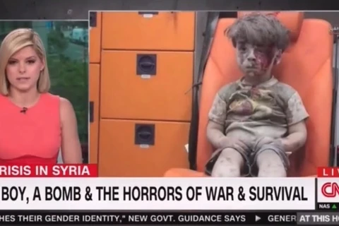 MC của CNN bật khóc ngay trên sóng khi đưa tin về em bé Syria