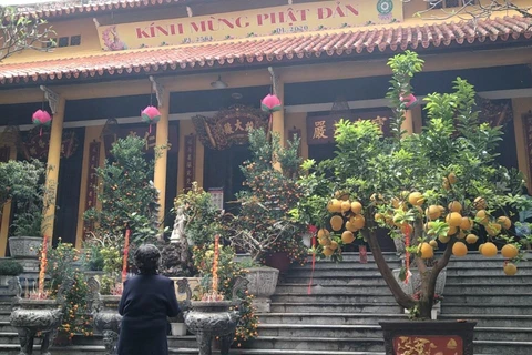 Chùa Quán Sứ mở cửa cho khách thập phương dâng hương lễ Phật ngày 8/3. (Ảnh: Minh Thu/Vietnam+)