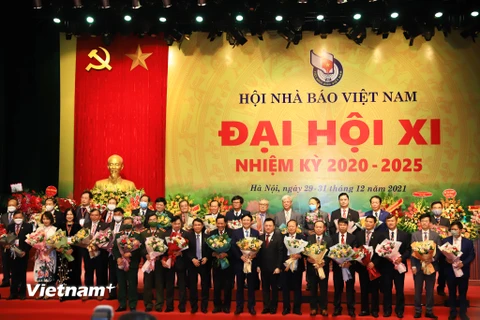 Công bố kết quả bầu Ban Chấp Hành, Ban Kiểm tra và các chức danh Lãnh đạo Hội khóa XI. (Ảnh: Hoài Nam/Vietnam+)