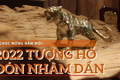 Bộ sưu tập 2022 tượng hổ sơn mài độc bản đón Xuân Nhâm Dân. (Ảnh: Minh Anh/Vietnam+)