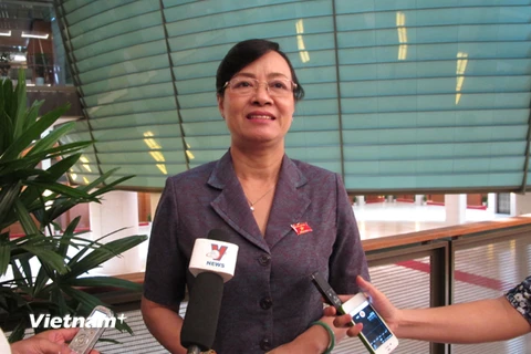 Đại biểu Quốc hội Nguyễn Thị Quyết Tâm đang trả lời báo chí. (Nguồn: Đức Duy/Vietnam+)