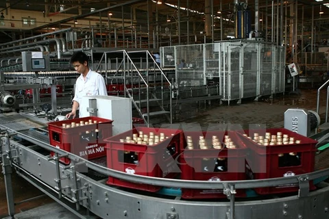 Dây chuyền sản xuất của Habeco tại nhà máy bia Hà Nội-Mê Linh. (Ảnh: Huy Hùng/TTXVN)
