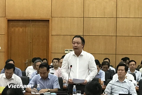 Ông Trần Hữu Linh nhận quyết định Tổng cục trưởng Tổng cục Quản lý thị trường từ ngày 12/10/2018. (Ảnh: Đức Duy/Vietnam+)