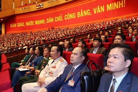 Các đại biểu dự phiên tham luận tại hội trường Trung tâm Hội nghị Quốc gia, sáng 27/1. (Ảnh: TTXVN)