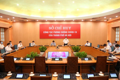 Cuộc họp của Sở Chỉ huy phòng, chống dịch COVID-19 thành phố Hà Nội. (Ảnh: PV/Vietnam+)