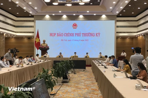 Phiên họp báo Chính phủ thường kỳ tháng 7/2021. (Ảnh: Xuân Quảng/Vietnam+)