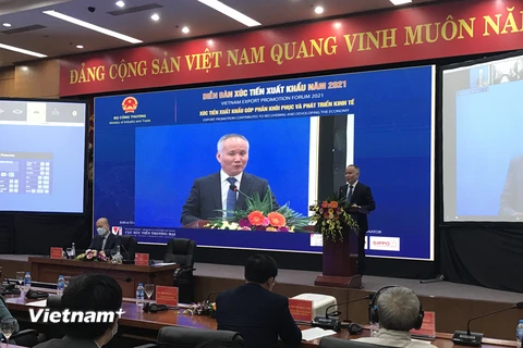 Thứ trưởng Bộ Công Thương Trần Quốc Khánh tại Diễn đàn Xúc tiến xuất khẩu Việt Nam 2021. (Ảnh: Đức Duy/Vietnam+)
