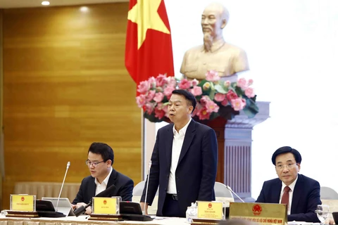 Thứ trưởng Bộ Tài chính Nguyễn Đức Chi thông tin tại phiên họp báo Chính phủ về quản lý trái phiếu riêng lẻ. (Ảnh: Xuân Quảng/Vietnam+)