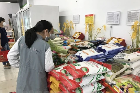 Doanh nghiệp đảm bảo đủ lượng gạo phục vụ nhu cầu tiêu dùng trong nước và xuất khẩu. (Ảnh: Đức Duy/Vietnam+)