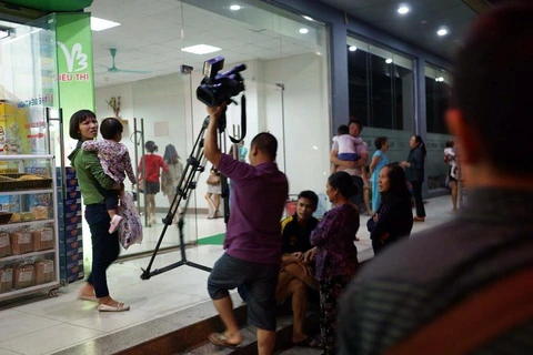 Đối tượng thu máy quay của phóng viên là nhân viên khách sạn Mường Thanh. (Ảnh: PV/Vietnam+)