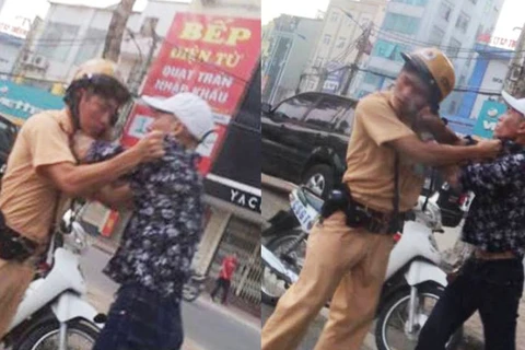 Dân “anh chị” đấm cảnh sát giao thông tới tấp vì bị dừng xe. (Ảnh: Otofun)