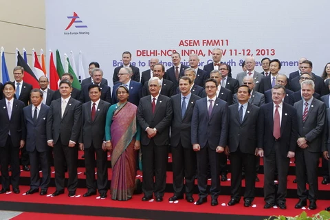 Các trưởng đoàn đại biểu tham dự phiên khai mạc Hội nghị ASEM. (Ảnh: Tiến Hiến/Vietnam+)