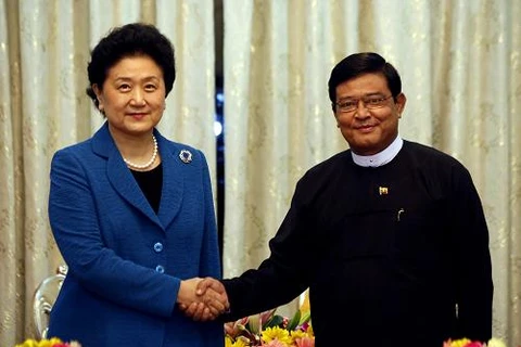Phó Thủ tướng Trung Quốc Lưu Diên Đông và Phó Tổng thống Myanmar U Nyan Tun. (Nguồn: gov.cn)