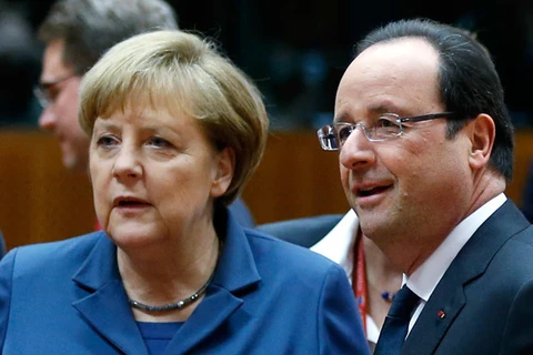 Thủ tướng Đức Angela Merkel và Tổng thống Pháp François Hollande. (Nguồn: AP)