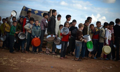 Khoảng 500.000 người Syria không nhận được cứu trợ lương thực do chiến tranh và lệnh cấm. (Nguồn: theguardian.com)