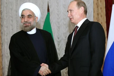 Tổng thống Nga Vladimir Putin (phải) và người đồng cấp Iran Hassan Rouhani. (Nguồn: presstv.ir)