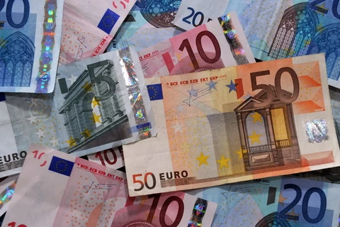 Một nghi phạm thừa nhận đã “rửa” ít nhất khoảng 36 triệu euro tiền mặt kể từ năm 2010. (Nguồn: AFP/TTXVN)