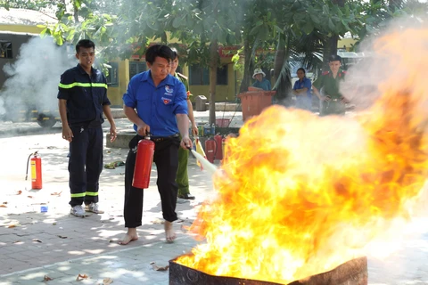 Hội thi phòng cháy chữa cháy tại Thành phố Hồ Chí Minh. (Ảnh: Thanh Vũ/TTXVN)