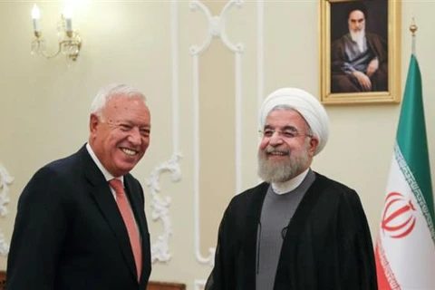 Tổng thống Iran Hassan Rouhani (phải) và Bộ trưởng Ngoại giao Tây Ban Nha Jose Manuel Garcia-Margallo. (Nguồn: ISNA)