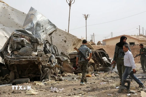 Hiện trường một vụ đánh bom ở Syria được cho là do IS thực hiện. (Nguồn: AFP/TTXVN)