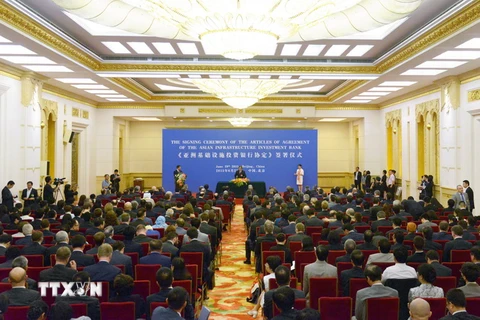 Toàn cảnh lễ ký kết thành lập AIIB ngày 29/6. (Nguồn: AFP/TTXVN)