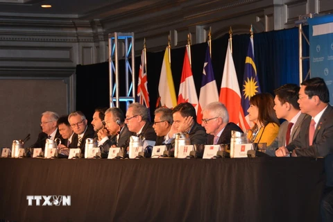 Bộ trưởng Thương mại các nước tham gia đàm phán TPP họp báo chung. (Nguồn: AFP/TTXVN)