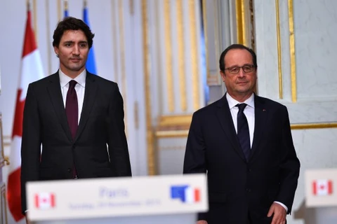 Thủ tướng Canada Justin Trudeau và Tổng thống Pháp Francois Hollande. (Nguồn: Getty Images)