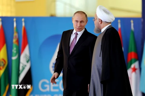 Ngày 23/11, Nga dỡ bỏ lệnh cấm và hạn chế trong hợp tác hạt nhân với Iran. (Nguồn: AFP/TTXVN)