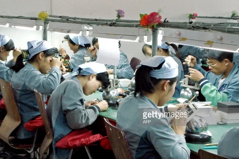 Công nhân làm việc trong nhà máy ở Kaesong. (Nguồn: AFP/Getty Images) 