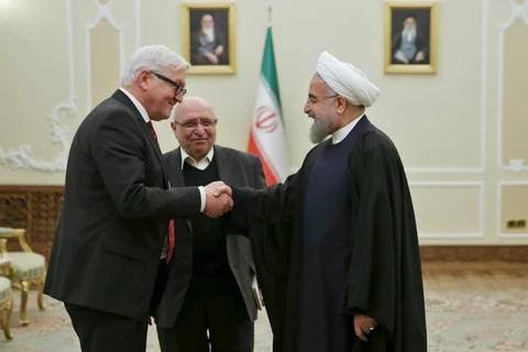Ngoại trưởng Đức Frank-Walter Steinmeier và Tổng thống Iran Hassan Rouhani. (Nguồn: Reuters)