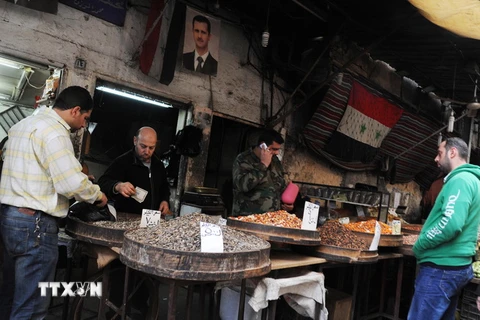 Người dân Syria được trở lại hoạt động thường nhật hàng ngày tại Damascus ngày 27/2, sau khi lệnh ngừng bắn có hiệu lực. (Nguồn: THX/TTXVN)