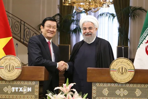 Chủ tịch nước Trương Tấn Sang và Tổng thống Cộng hòa Hồi giáo Iran Hassan Rouhani tại cuộc gặp gỡ báo chí. (Ảnh: Nguyễn Khang/TTXVN)