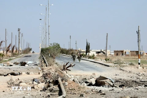 Cảnh đổ nát sau các cuộc giao tranh giữa quân đội Chính phủ và phiến quân tại Aleppo. (Nguồn: AFP/TTXVN)