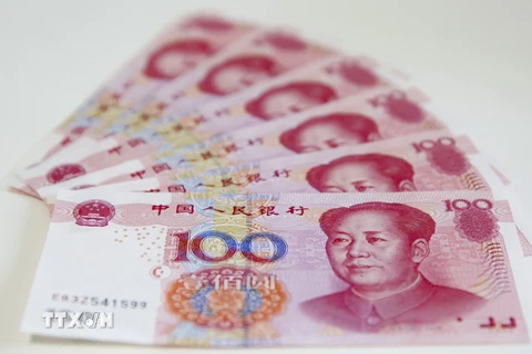 Đồng tiền giấy của Trung Quốc mệnh giá 100 nhân dân tệ tại thủ đô Bắc Kinh tháng 8/2015. (Nguồn: EPA/TTXVN)