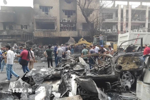 Hiện trường vụ đánh bom ở Karada, Baghdad ngày 3/7. (Nguồn: THX/TTXVN)