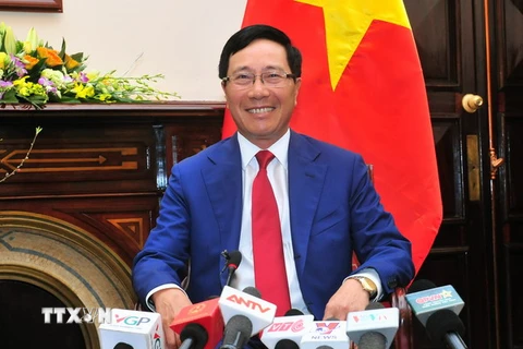Phó Thủ tướng Chính phủ, Bộ trưởng Ngoại giao Phạm Bình Minh trả lời phỏng vấn. (Ảnh: Nguyễn Khang/TTXVN)
