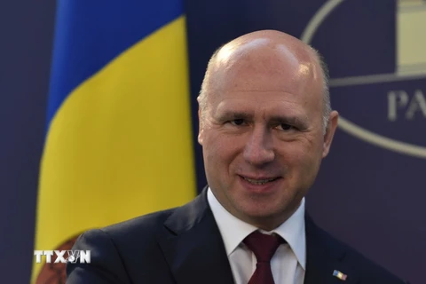 Thủ tướng Moldova Pavel Filip phát biểu tại một cuộc họp báo ở Bucharest, Romania ngày 26/1. (Nguồn: AFP/TTXVN)