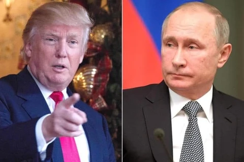 Tổng thống Nga Vladimir Putin (phải) và người đồng cấp Mỹ Donald Trump. (Nguồn: telegraph.co.uk)