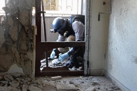 Chuyên gia Liên hợp quốc điều tra vũ khí hóa học ở Syria.(Nguồn: AFP)