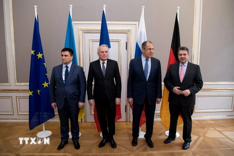 Ngoại trưởng các nước thuộc Nhóm Bộ tứ Normandy (từ trái sang): Ukraine - Pavlo Klimkin, Pháp - Jean-Marc Ayrault, Nga - Sergei Lavrov và Đức - Sigmar Gabriel sau cuộc đàm phán ở Munich ngày 18/2. (Nguồn: AFP/TTXVN)