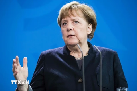Thủ tướng Đức Angela Merkel phát biểu tại cuộc họp báo ở Berlin ngày 23/2. (Nguồn: AFP/TTXVN)