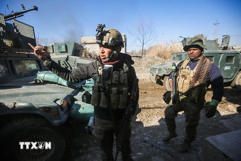 Quân Chính phủ Iraq trong chiến dịch giành lại quyền kiểm soát thành phố Mosul từ tổ chức Nhà nước Hồi giáo (IS) tư xưng ngày 26/2. (Nguồn: AFP/TTXVN)
