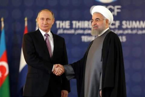 Tổng thống Iran Hassan Rouhani (phải) và Tổng thống Nga Vladimir Putin. (Nguồn: AFP)