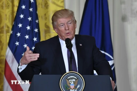 Tổng thống Mỹ Donald Trump trong cuộc họp báo ở Washington, DC ngày 12/4. (Nguồn: AFP/TTXVN)