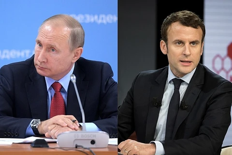 Tân Tổng thống Pháp Emmanuel Macron (phải) và người đồng cấp Nga Putin. (Nguồn: theartnewspaper.com)